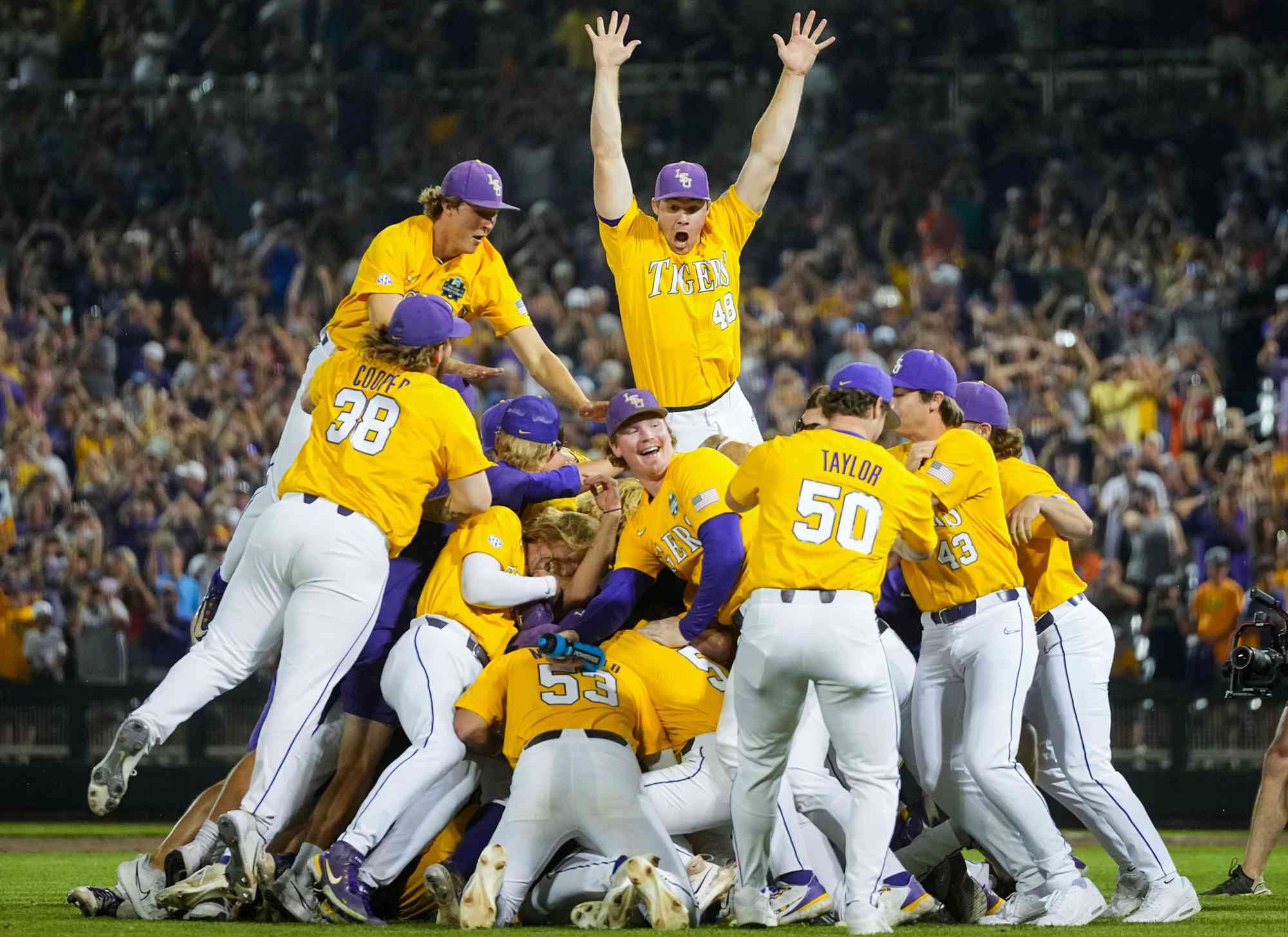 LSU Tigers baseball players celebrate victory on field amid cheering crowd. LSU Tigers baseball players celebrate victory on field amid cheering crowd.