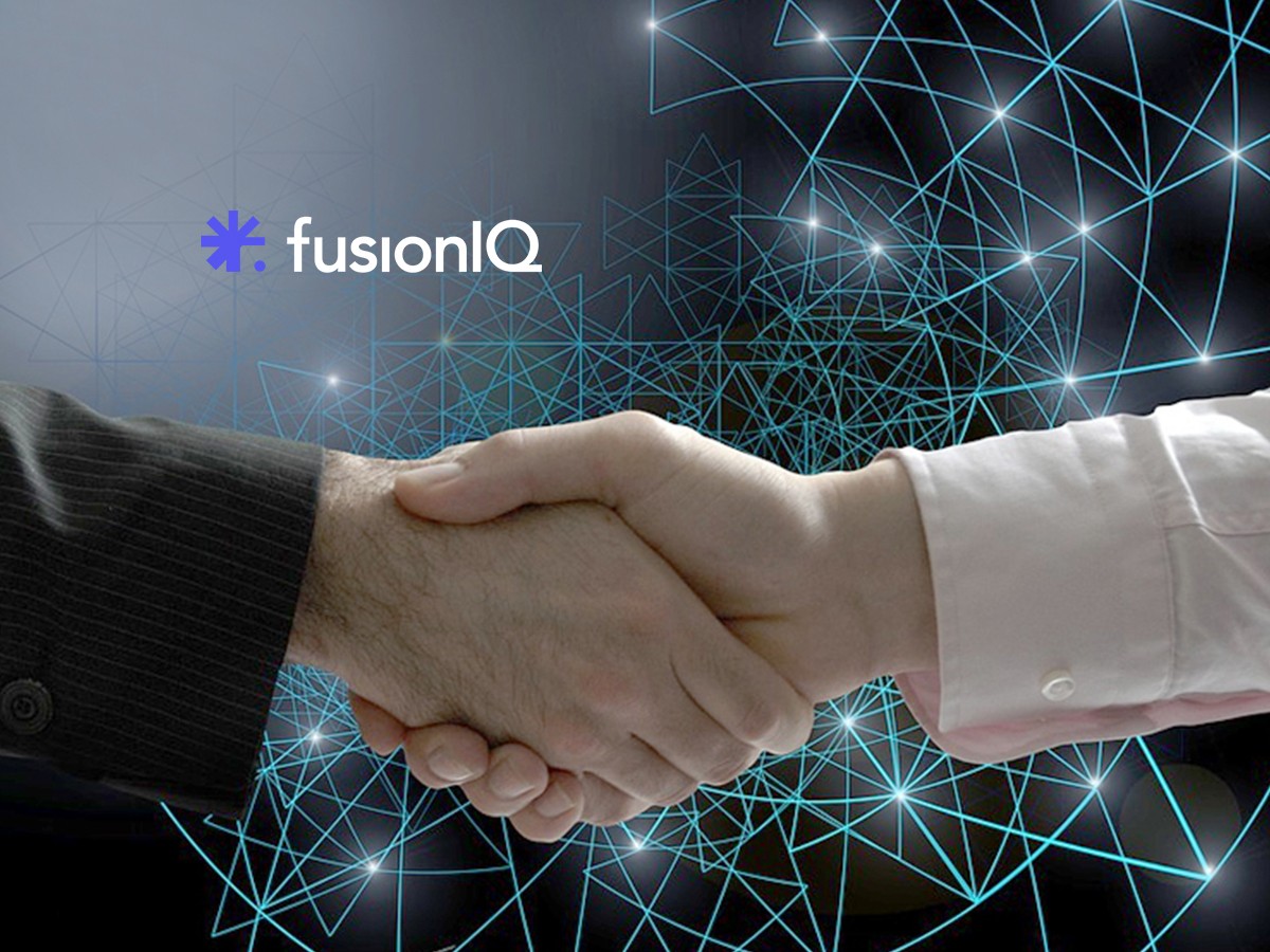 Two business hands shake against a blue geometric network background with "fusionIQ" logo. Two business hands shake against a blue geometric network background with "fusionIQ" logo.